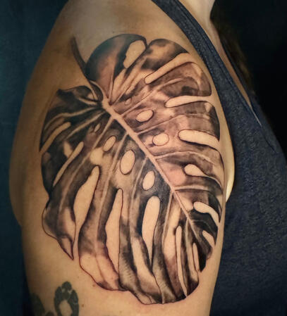 Black and Gray leaf Black and Gray floral tattoo by Desiree in Appleton, Wisconsin
